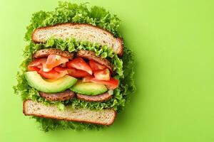 Top View Of Blt Sandwich With Avocado On Vibrant Background With Copy Space, Food Photography photo