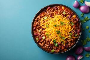Top View Of Chili With Cheese And Onions On Vibrant Background With Copy Space, Food Photography photo