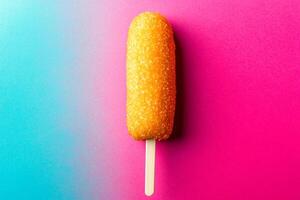 Top View Of Corn Dog With Mustard On Vibrant Background With Copy Space, Food Setting photo