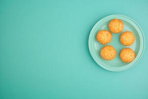 Top View Of Maryland Crab Cakes With Remoulade On Vibrant Background With Copy Space, Food Image photo