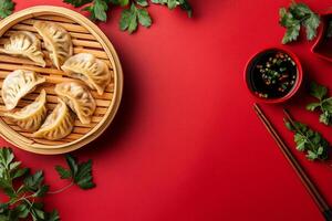 Top View Of Pork Dumplings With Soy Ginger Sauce On Vibrant Background With Copy Space, Food Image photo