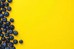 Top view Blueberry on a vibrant background, plant setting photo