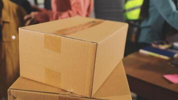 A stack of boxes sitting on top of a table video
