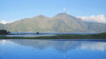 Scenic Hillside Lake View with Swimming Pool in Kintamani Bali 4K video