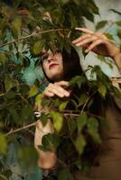 A Mystifying Woman Engaging with Nature in a Beautiful and Serene Setting of Enchantment photo