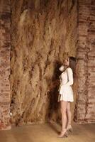 A Surreal and UpsideDown Model Presenting an Artistic Experience Within Space and Time photo