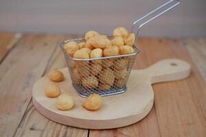 Delicious Golden Fried Snacks in a Wire Basket photo