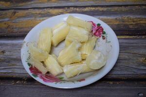 Soft boiled cassava is a typical snack that is often enjoyed in various regions. photo