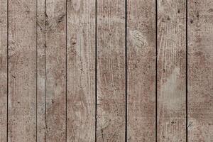 A collection of weathered wooden planks showcases a rustic texture and natural aging. These planks are ideal for home decor, craft projects, and design inspirations at any time photo