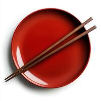 Red plate with wooden chopsticks isolated on transparent background photo