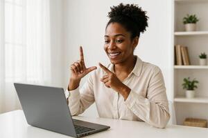 Woman using sign language during call, online communication and accessibility, inclusive education and remote learning photo