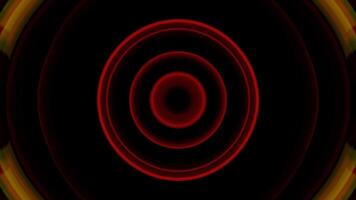 a red and yellow circular pattern on a black background video