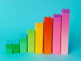 Stack of colorful toy block with a blue background photo