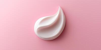 cream is on a pink background photo