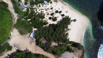 Sideways Drone Shot Over Coastline and Partial Island, East Java, Indonesia video