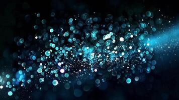 Dynamic blue bokeh background particles video