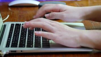 work computer, Hands typing on laptop keyboard, showing digital work, communication, creativity, and modern technology in everyday life, The shot highlights precision and focus, typing on keyboard video