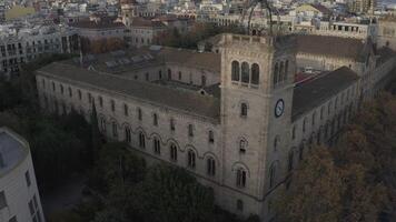 Bird's-eye view of University of Barcelona. Overview of a historic building in the city center from a drone photo