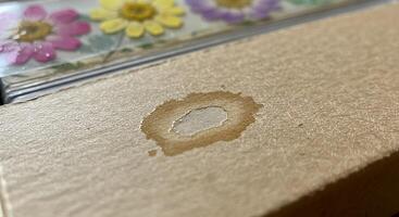 A close up of a box with a hole in it photo