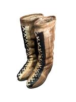 A pair of exquisite, handmade reindeer fur boots are showcased in a three-quarter view on a pure white background. The intricate craftsmanship is evident in the natural brown and black fur patterns photo