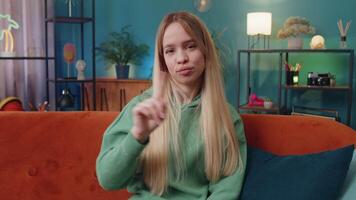 Displeased young woman reacting to unpleasant awful idea, dismiss bad idea, wave hand, shake head No video