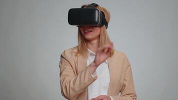 Business woman use virtual reality headset helmet to play simulation game app watching content video