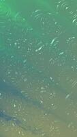 Green and blue abstract background perfect for marketing materials, web design, and artistic projects. Swirling patterns provide a captivating visual effect. video