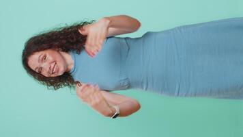 Woman showing inviting gesture with hands, ask to join, beckoning to coming, gesturing hello goodbye video
