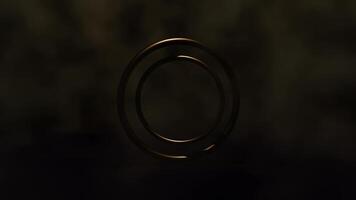 Rotating Golden Double Rings Over Subtle Dark Background in Looping Animation video