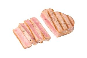 Perfectly cooked grilled tuna steak, a must try for seafood enthusiasts seeking a delicious and nutritious meal. isolated on white background. top view photo