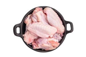 Juicy uncooked chicken wings, a versatile ingredient perfect for frying, baking, or grilling to perfection. isolated on white background. top view photo