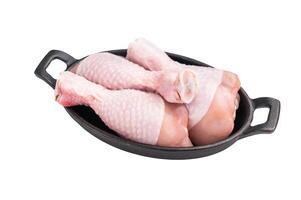 Raw chicken legs drumsticks, perfect for roasting or frying, offering a delicious and juicy flavor in every bite. isolated on white background. top view photo
