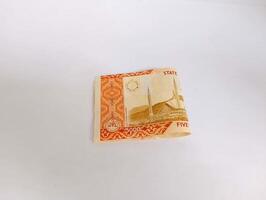High-value PKR 5000 currency displayed in sharp detail. photo