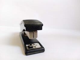 Stapler device for organized workspaces and neat results. photo