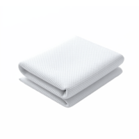 White folded pillow with textured surface on transparent background png