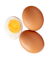 Three chicken eggs and cooked or boiled chicken egg with egg yolk in half isolated with clipping path in file format png