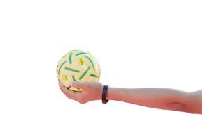 Isolated sepak takraw holding in hand with clipping paths. photo