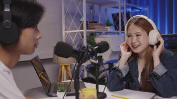 Creative podcast host enjoying conversation during live studio session video