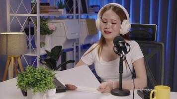 Podcast host reading listener message and responding on air video