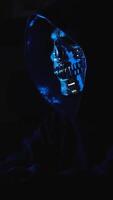 Masked hacker browsing anonymous forums on the dark web representing privacy abuse and digital risk video