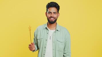 Magician wizard man gesturing with magic wand making wish come true, casting magician spell video