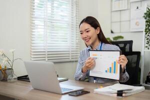 Data Presentation. Businesswoman showing graph in call. photo