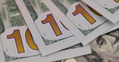 a large figure of 100 face value for US dollars photo
