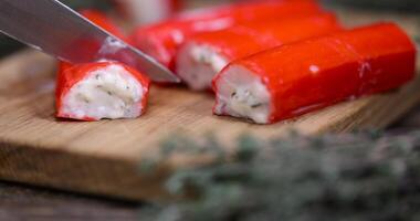 imitation crab meat with the addition of creamy filling with spices photo