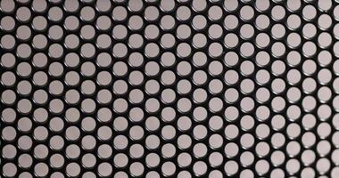 a mesh to protect electrical appliances from debris and other objects that can damage the appliance, a metal mesh with small holes photo