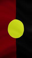 Australian Aboriginal Waving Flag in Vertical Orientation. Realistic Flag Animation. Seamless Loop Background. video