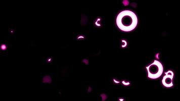dinâmico abstrato animação com brilhando Rosa esferas e crescente formas flutuando em uma Preto fundo movimento gráficos ciclo video