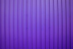 Abstract background featuring vertical stripes in shades of purple, ideal for modern design, branding, or digital art projects. photo