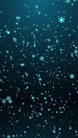 Blue snowflakes falling to the ground on a dark background, vertical composition. Standard speed. Loop animation footage for graphic design. video