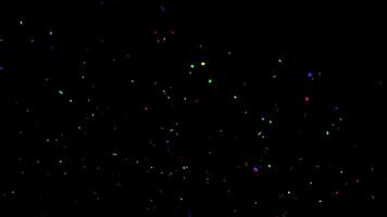 Colorful confetti explosion from bottom left isolated on a dark background, horizontal composition. Small size. Standard speed. Animation footage for graphic design. video